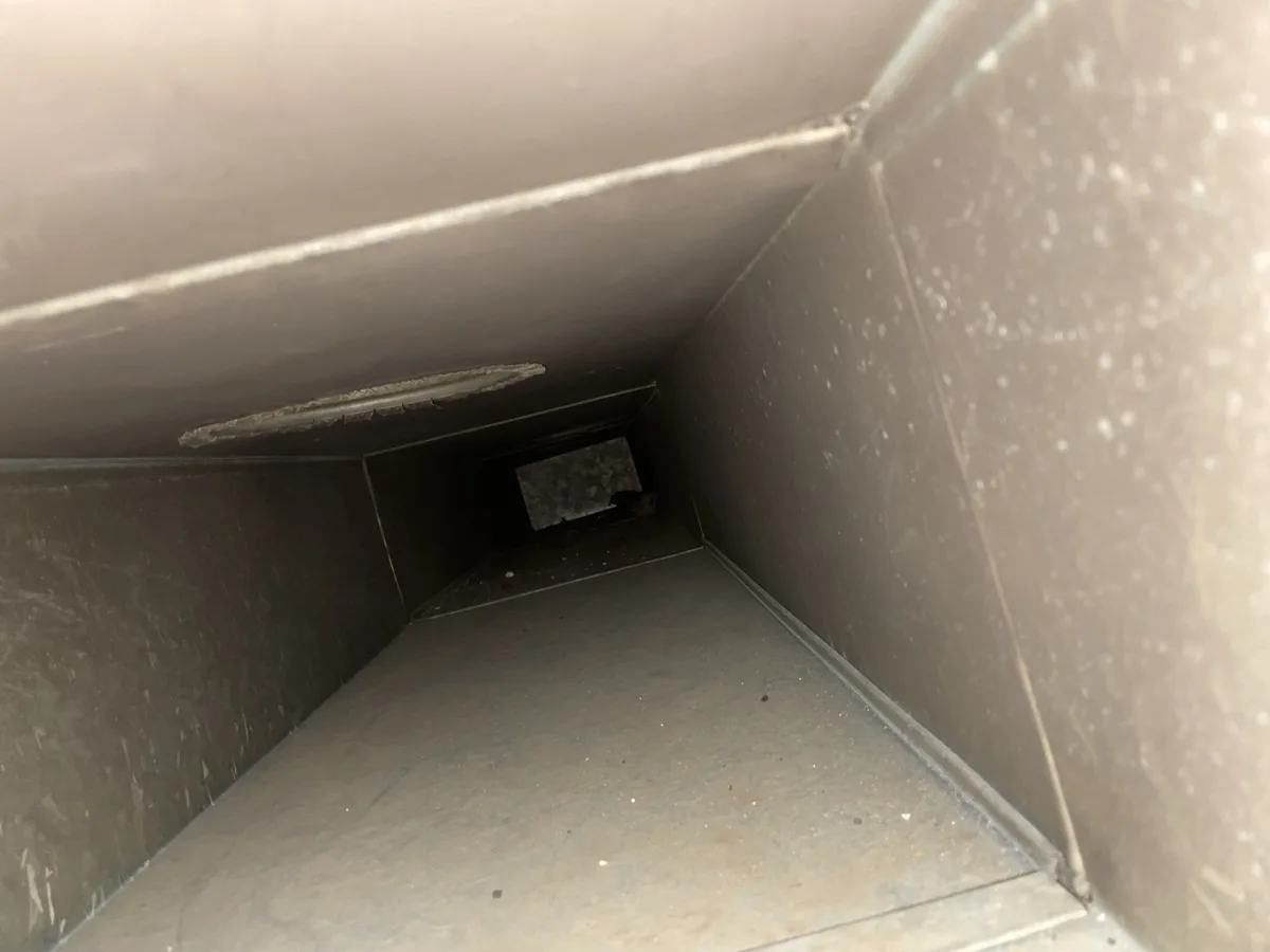 AFTER air duct cleaning: same steel return trunk completely clean