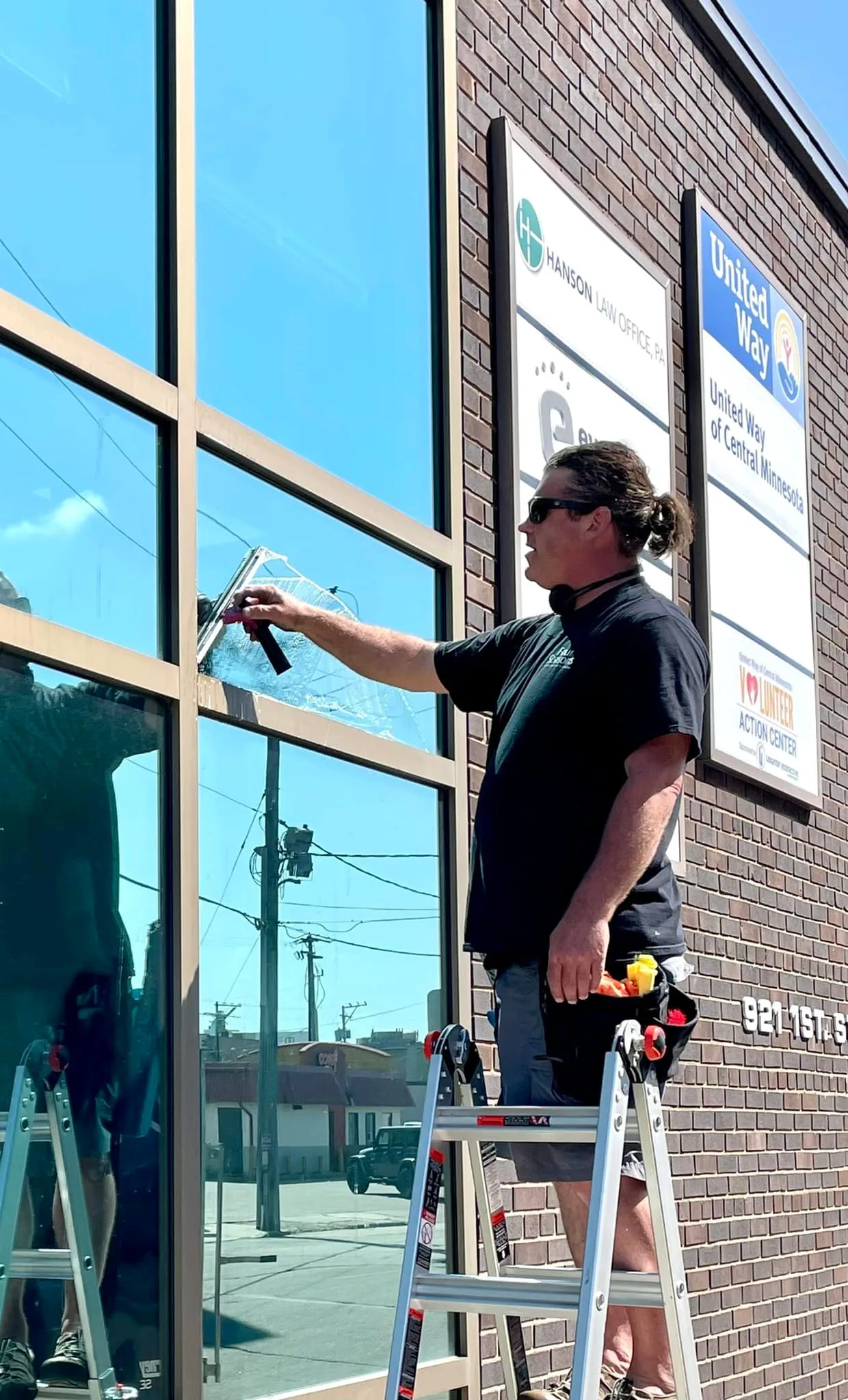 Window cleaning on commercial storefront
