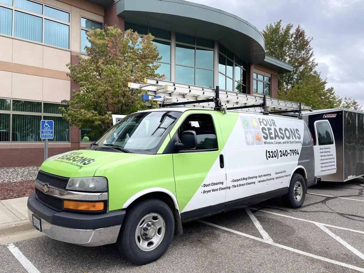 Four Seasons branded service van at a commercial job site