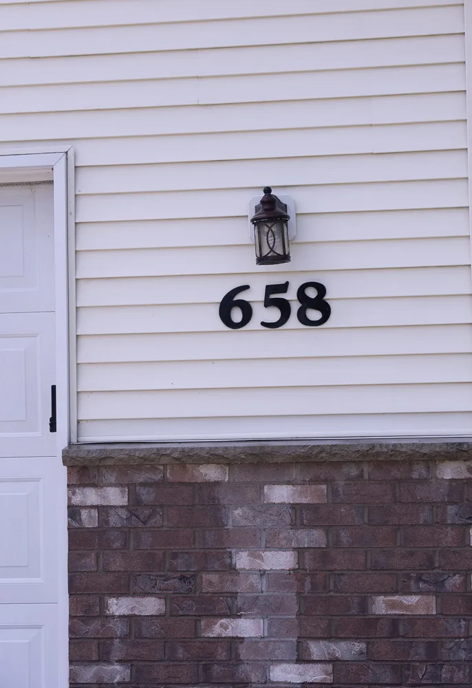 AFTER soft washing: the same vinyl siding completely clean with no streaking or algae